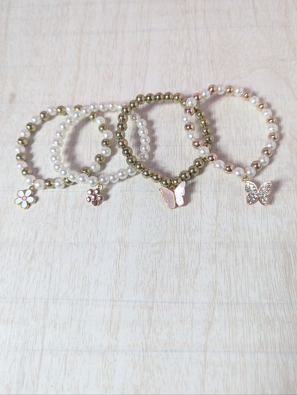 Bracelets set of 4 cute pink and rose colors